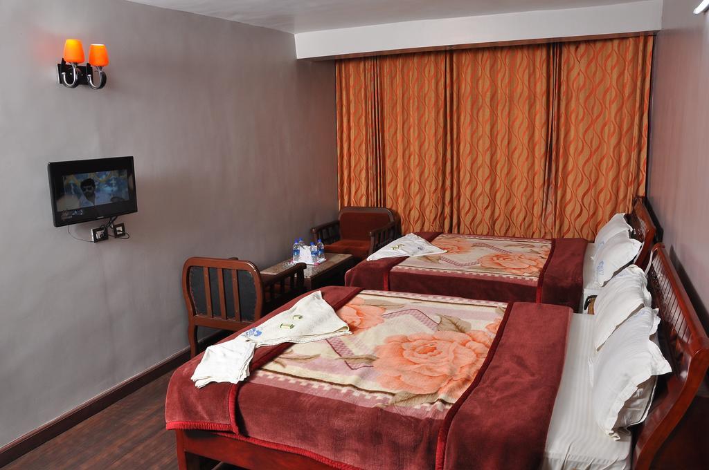 Grand Paradise Inn Kodaikanal Kamer foto